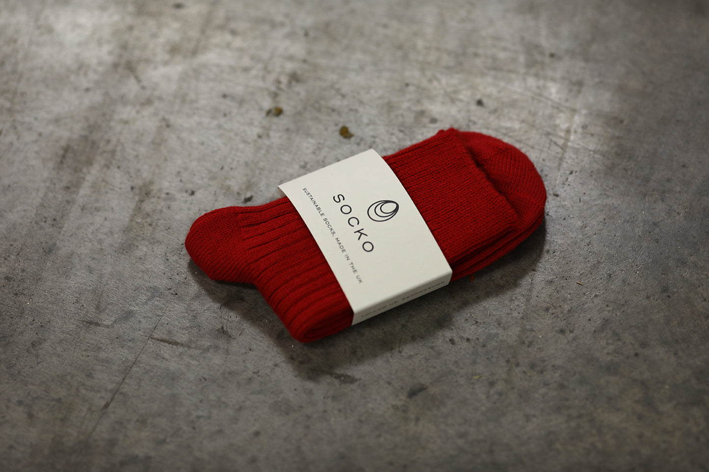 Small red merino cashwool socks made by Socko